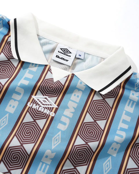 BUTTER GOODS / UMBRO - VERT JERSEY SKY/BROWN